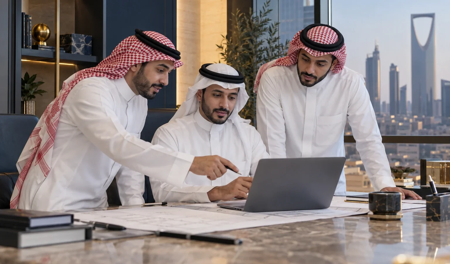 Saudi professionals collaborating in a Riyadh office